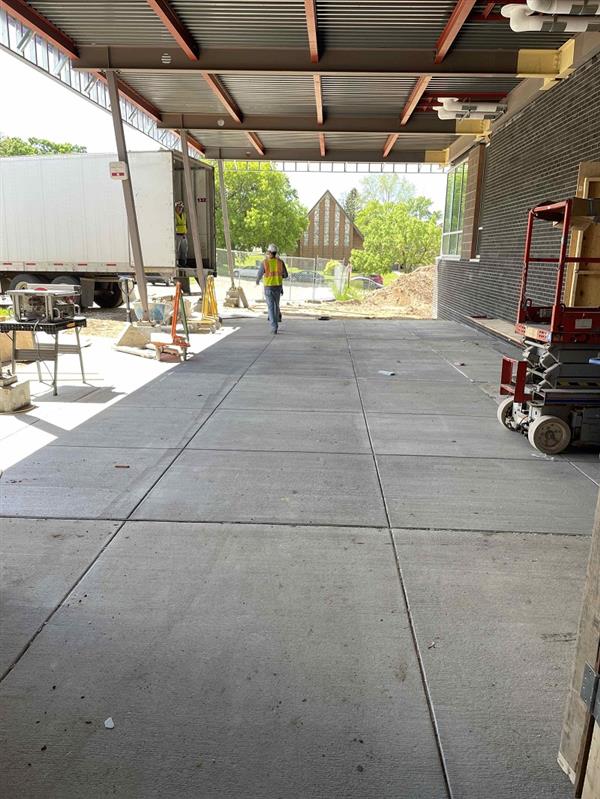 Concrete slab under new main entry canopy